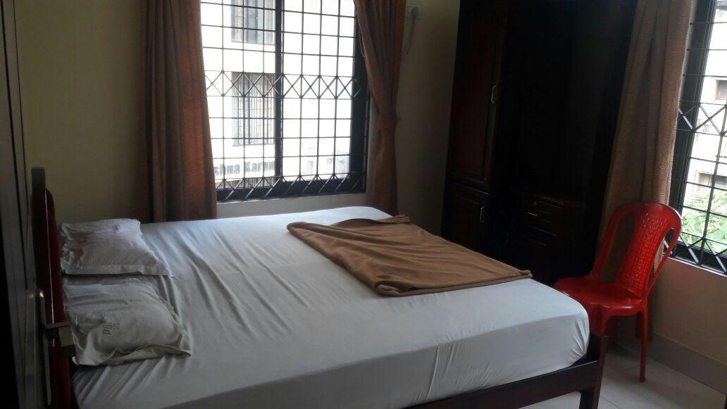 Poonthanam Guest House Гуруваюр Экстерьер фото